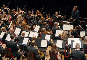 Conductor in front the orchestra